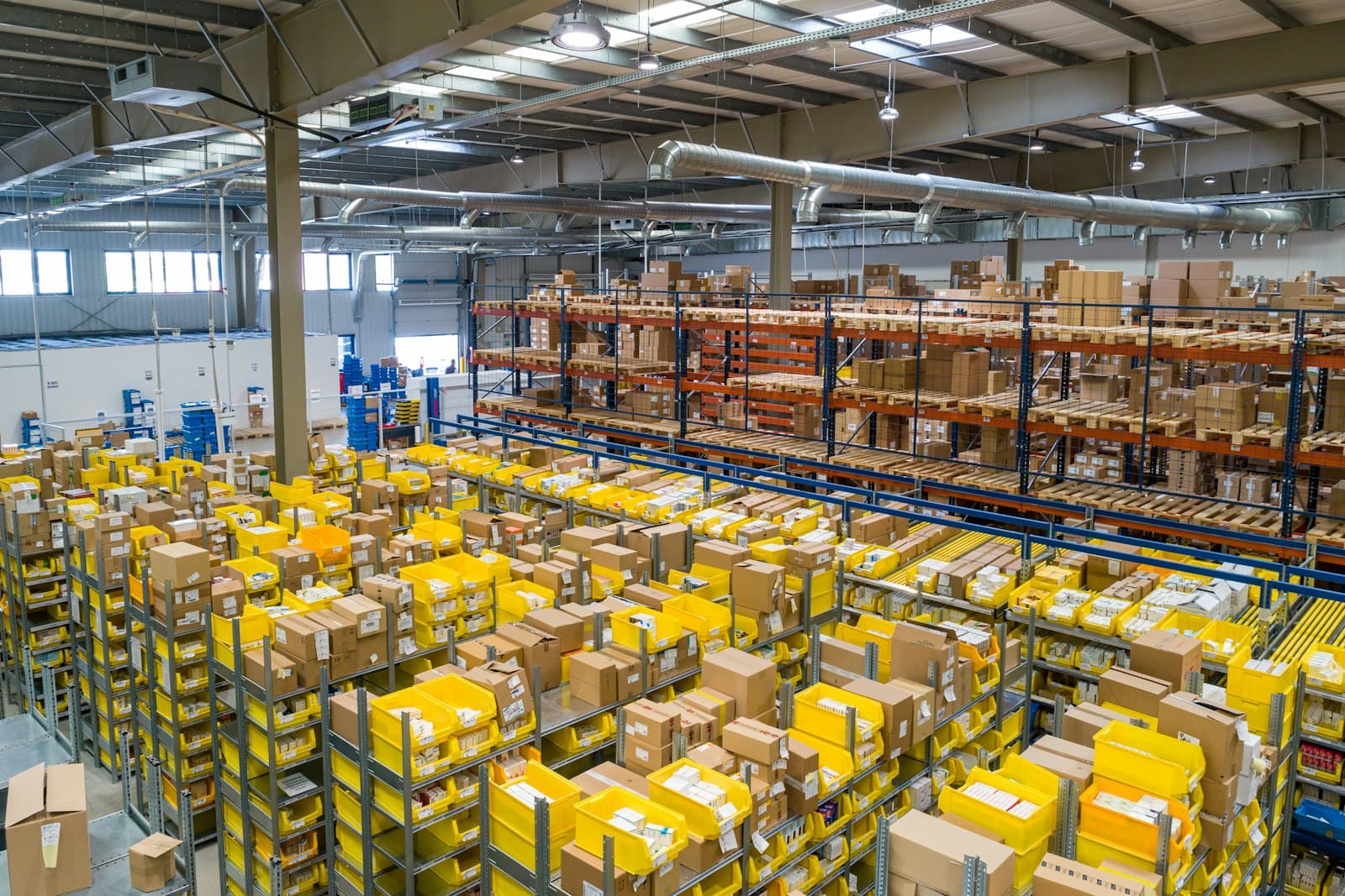 Warehouse aisle with stacked inventory